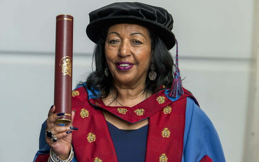 SuAndi receiving her honorary degree from Manchester Metropolitan University, July 2019.